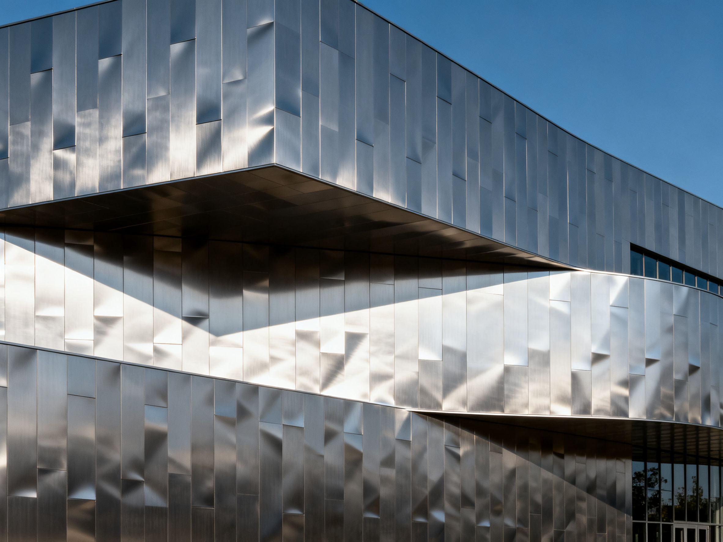 Modern building facade with aluminum 3D panels